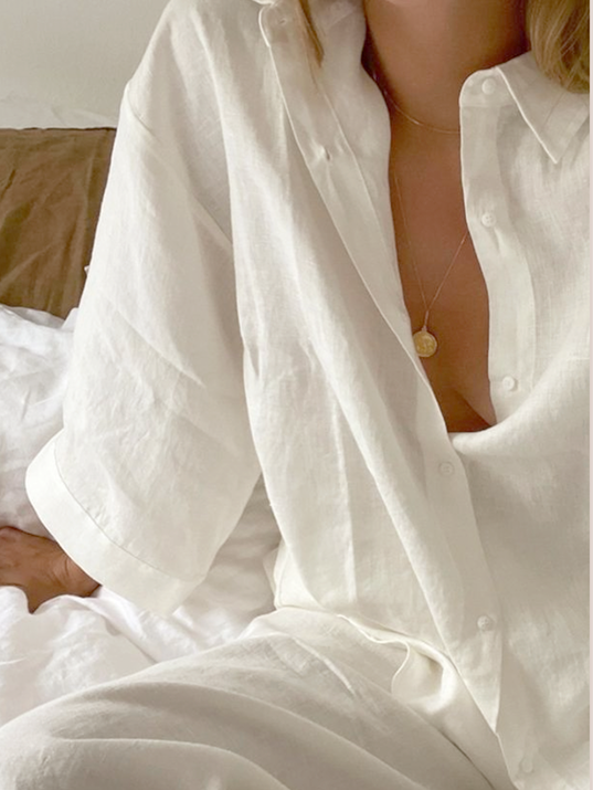 Woman in white linen shirt